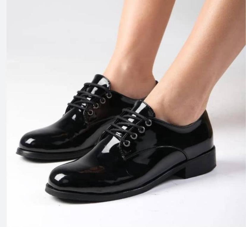 women’s black patent leather Oxford