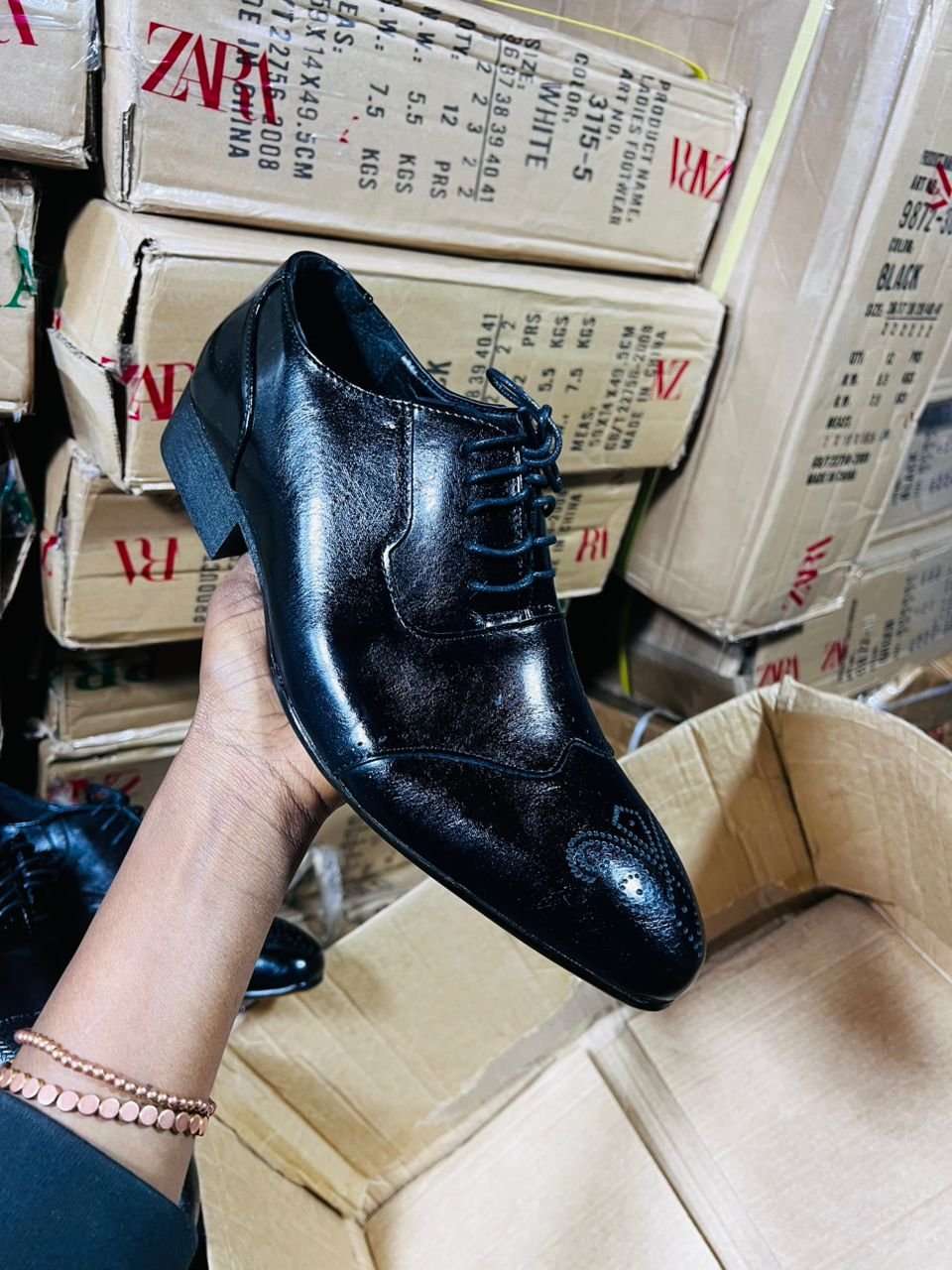 black leather shoe