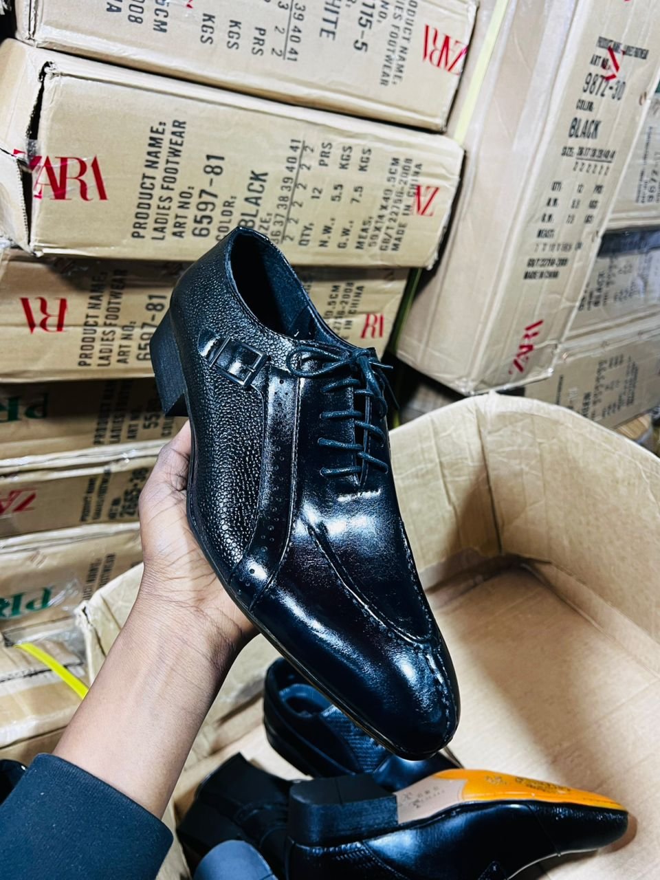 black leather shoe