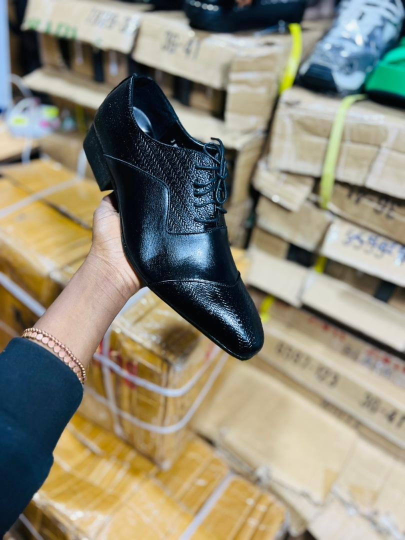 black leather lace-up dress shoes,