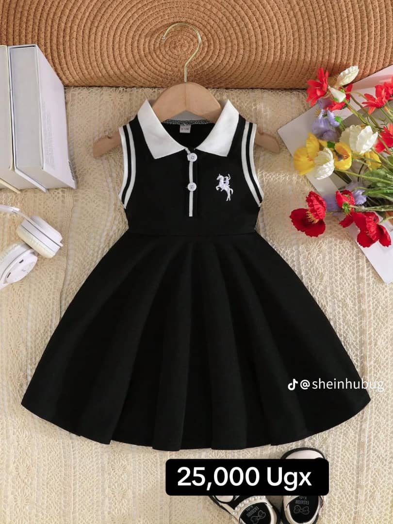 black, sleeveless, collared dress for a baby girl