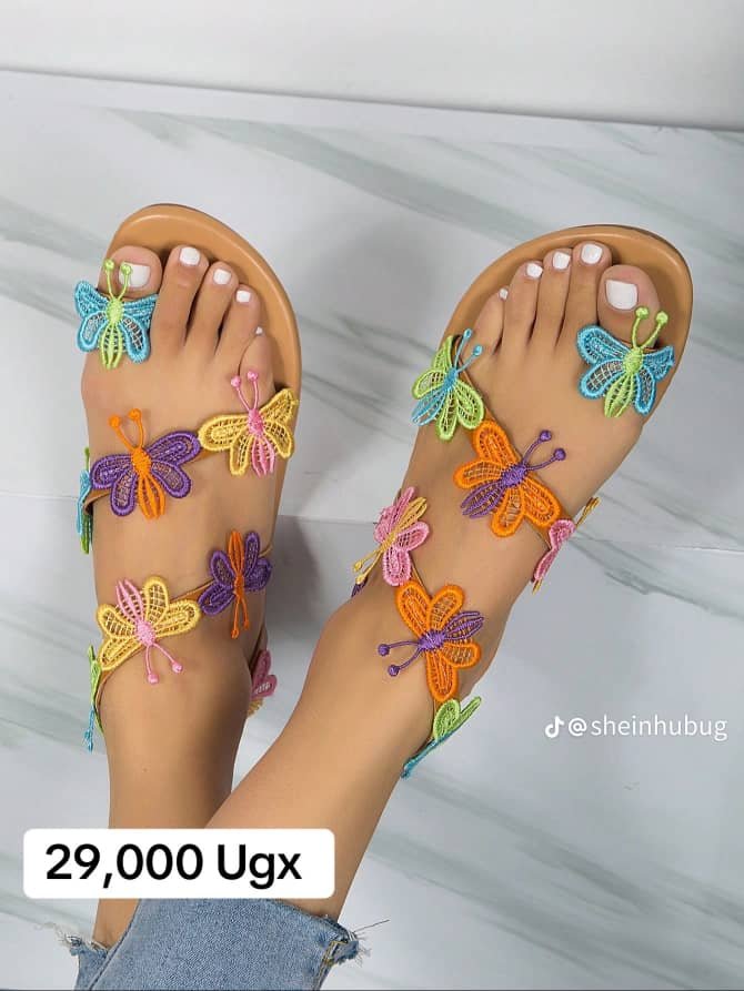 flip-flops with colorful butterfly decorations